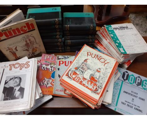 An incomplete set of The New Punch Library hardback books with illustrations together with a quantity of 1950's Punch magazin