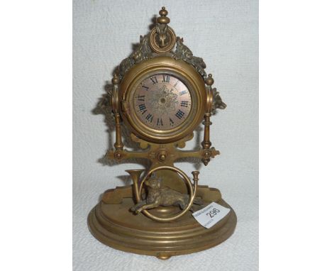 Victorian brass desk clock decorated with a running fox, hunting horn and foxes mask (no movement)