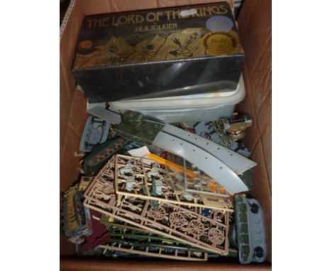 Box of assorted plastic figures, Lord of The Rings tapes etc