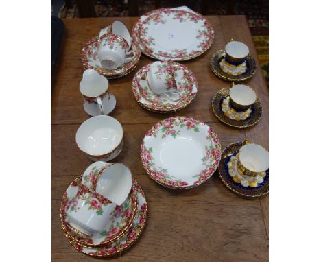 A ROYAL STAFFORD  'OLDE ENGLISH GARDEN' PART TEASET and three Victorian Royal blue and gilt tea cups with six saucers