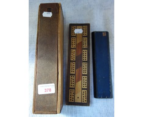 A COLLECTION OF 19TH CENTURY BONE AND EBONY DOMINOES, a Victorian Tartan Ware cribbage board and another cribbage board