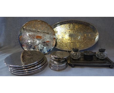 A 19TH CENTURY PEWTER DESK SET with cut glass inkwells and a collection of silver plated mats with a tray