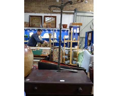 A SET OF 19TH CENTURY BRASS SCALES with a mahogany base (no pans)