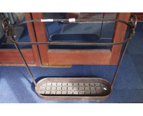 A CAST AND WROUGHT IRON STICK STAND, 70cm wide