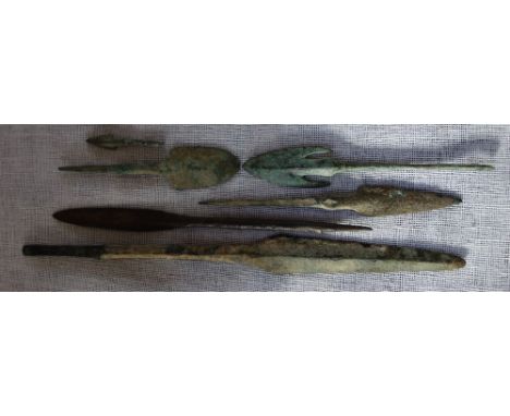 A LURISTAN 'SWALLOW TAIL' ARROW HEAD and five similar items