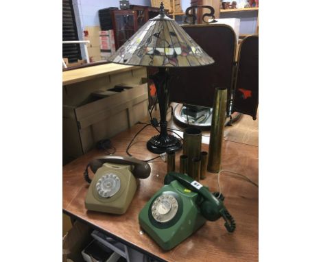 Tiffany style lamp, two GPO telephones and brass shell cases