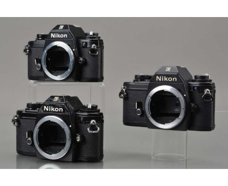 Three Nikon EM Camera Bodies, black, one body G-VG, shutter working, meter responsive, responsive in auto, self timer working
