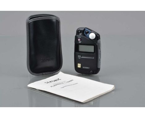 A Sekonic Flashmate L-308B Light Meter, powers on, display working, meter responsive, VG, in soft Sekonic case, with manual