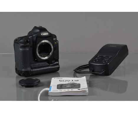 A Canon EOS-1 Ds Mark II DSLR Camera Body, powers up, shutter working, display working, otherwise untested,  body G, slight w