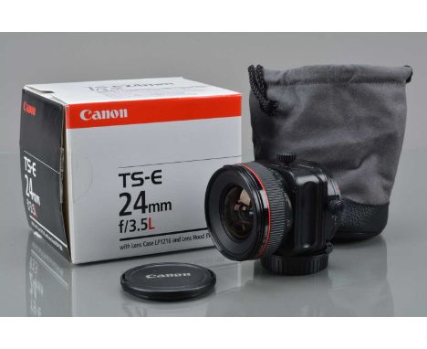 A Canon TS-E 24mm f/3.5 L Lens, tilt, shift, rotation all move freely, barrel VG, elements VG, with front and rear caps, soft