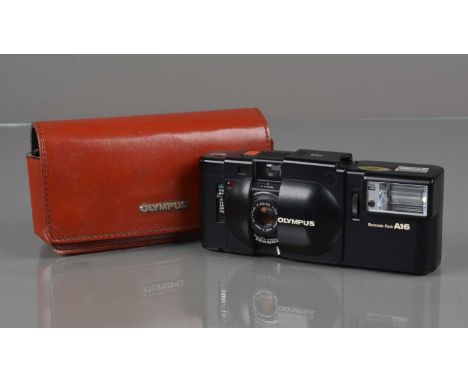An Olympus XA Compact Camera, shutter working, self timer working, body G, light wear, elements VG, with A16 flash, flash wor