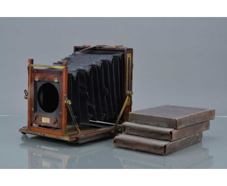 A W. Watson & Sons Whole Plate Mahogany and Brass Camera,  double extension, body G, some tarnishing to brass, bellows F-G, w