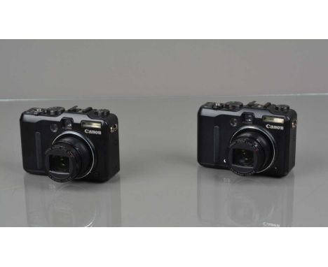 Two Canon G9 Digital Cameras, both power up, shutters working, flashes working, responsive in settings, bodies G-VG, elements