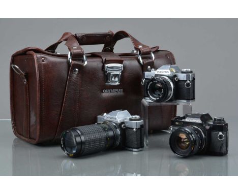 Three Olympus OM SLR Cameras, two OM-20,shutters working, meyers responsive, responsive in auto, self timers working, bodies 