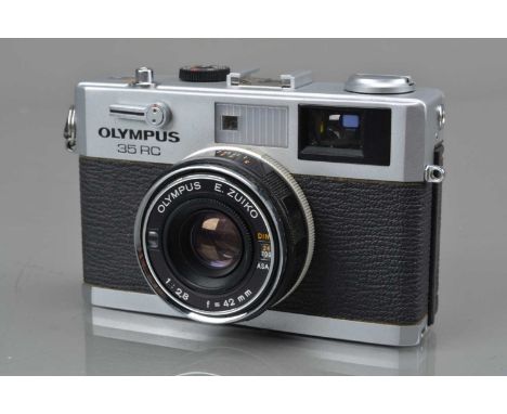 An Olympus 35 RC Rangefinder Camera, shutter working, meter responsive, camera responsive in auto, rangefinder functions, sel