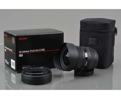 A Sigma 12-25mm f/4.5-5. II DG HSM Lens, Canon EF mount, auto focus working. barrel G-VG, elements VG, with front & rear caps