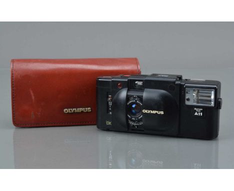 An Olympus XA 4 Macro DX Compact Camera, shutter working, self timer working, exposure light working, shutter responsive, bod