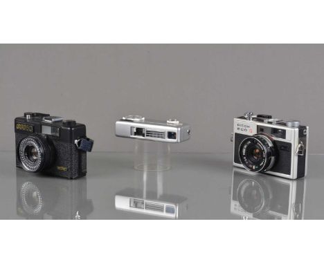 Three Compact Cameras, a FED 50, light cell responsive, responsive in auto, shutter working, body G-VG, elements G-VG, Ricoh 