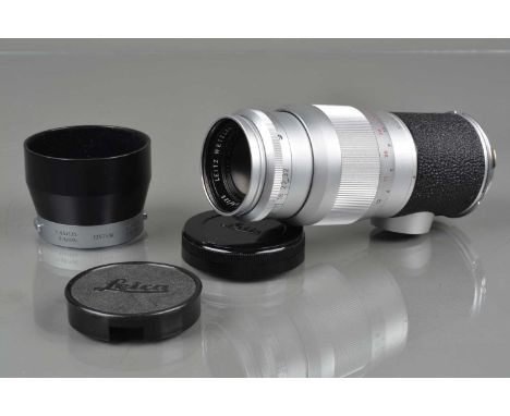 A Leitz Wetzlar Hektor 135mm f/4.5 Lens, M mount, serial no 1737092, 1960, barrel G, elements G-VG, with 12575 N hood and cap
