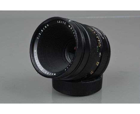 A Leitz Wetzlar Macro Elmarit-R 60mm f/2.8 Lens, 3 CAM, serial no 2829933, 1977, barrel G, light paint wear to grip, elements