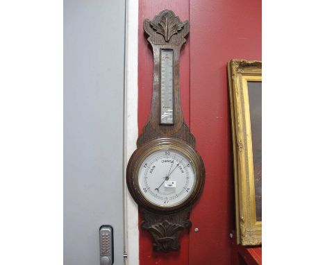 Early XX Century Oak Anoroiod Two Dial Barometer, with a shaped top and base, 90cm