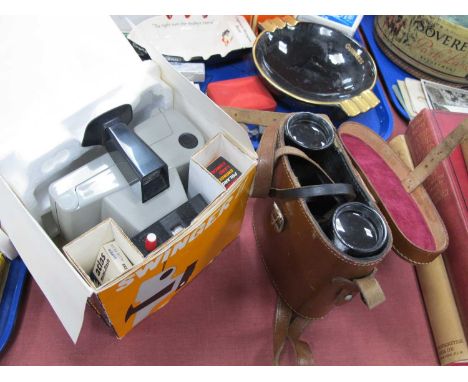 Tonelle 8 x 40 binoculars in leather case, polaroid swingor II camera.