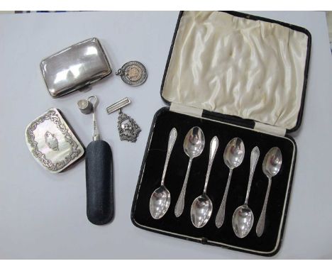 Silver items - a cased set of six silver spoons (Birmingham 1929), a cigarette case (Birmingham 1918), a cased Mother of Pear