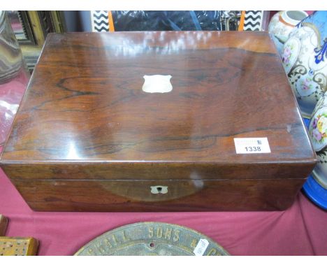 A XIX Century Rosewood Writing Box, with mother of pearl blank shield nameplate and escutcheon, morocco toole slope and fitte