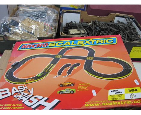 A Hornby 'O' Gauge Train Set, including engine, trucks, track, etc; plus an extra quantity of track and a boxed Scalextric se