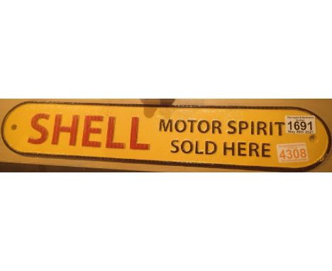 Cast iron Shell Motor Spirit sign, L: 50 cm. P&amp;P Group 2 (£18+VAT for the first lot and £3+VAT for subsequent lots) 