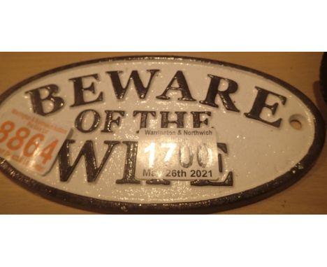 Cast iron Beware of The Wife sign with cast iron Beware of the Husband sign, both L: 18 cm. P&amp;P Group 1 (£14+VAT for the 