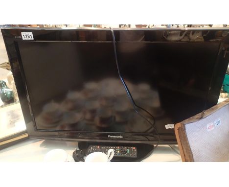 A Panasonic 21" flat screen TV with remote. Not available for in-house P&amp;P, contact Paul O'Hea at Mailboxes on 01925 6591