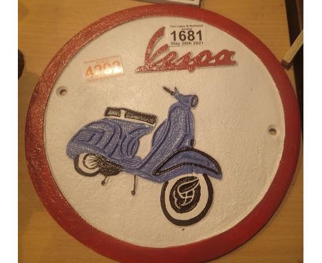 Cast iron Vespa scooter sign, D: 24 cm. P&amp;P Group 2 (£18+VAT for the first lot and £3+VAT for subsequent lots) 