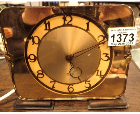 Vintage electric clock with glass front panel. Not available for in-house P&amp;P, contact Paul O'Hea at Mailboxes on 01925 6
