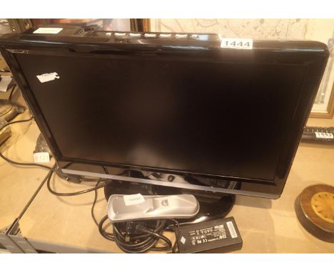 Kenmark flatscreen TV and remote. Not available for in-house P&amp;P, contact Paul O'Hea at Mailboxes on 01925 659133 Conditi