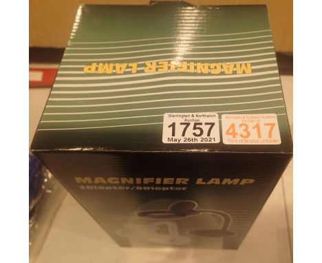 New and boxed illuminating magnifier lamp. P&amp;P Group 2 (£18+VAT for the first lot and £3+VAT for subsequent lots) 