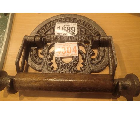 Cast iron St Pancras 1883 toilet roll holder, H: 18 cm. P&amp;P Group 2 (£18+VAT for the first lot and £3+VAT for subsequent 