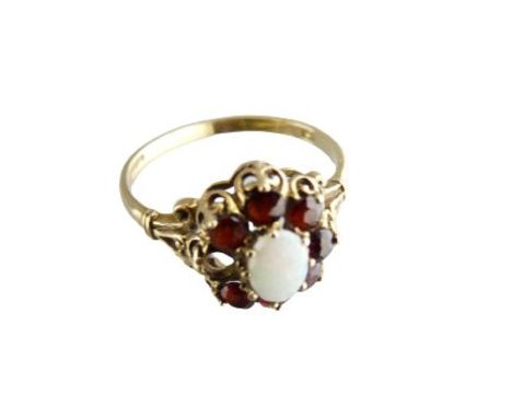 DRESS RING - centre opal and garnet cluster, size R, 2.4grms (one missing garnet)