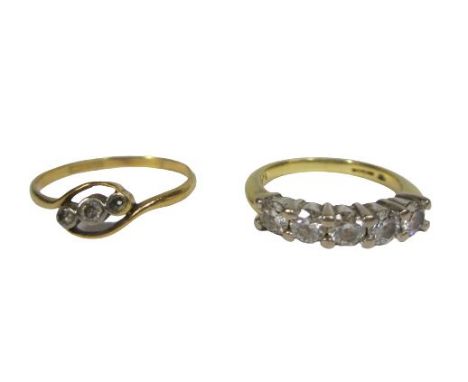 18CT GOLD DRESS RINGS (2) - one having a row of five synthetic diamonds, size mid M-N, stamped '750', the other in crossover 