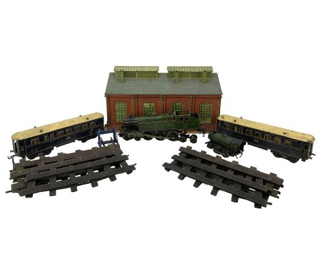 Hornby tin plate O Gauge twin rail engine shed, L46cm, LNER 4-6-4 locomotive, Hornby tank engine, two Hornby Wagon Lits and a