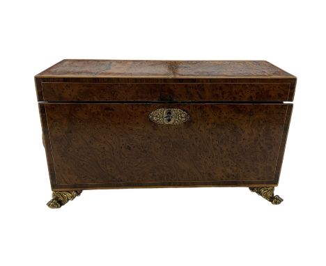 Early to mid 19th century burr yew wood tea caddy, of sarcophagus form with string banding, the fitted interior with velvet l