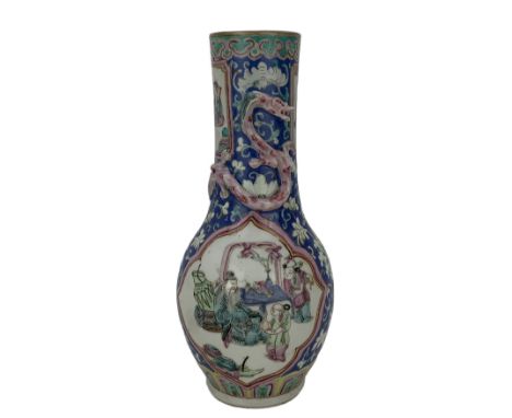 19th century Chinese famille rose vase, decorated with two lozenge shape reserves depicting figures in an interior setting an