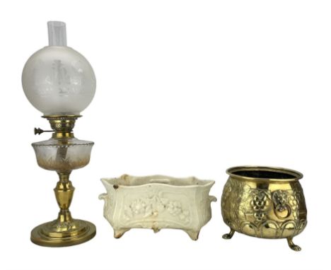 Art Nouveau brass oil lamp with embossed stylized base, frosted glass shade and glass funnel, H63cm including glass, cast iro