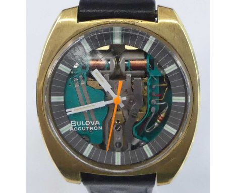 A Bulova Accutron gent's stainless steel and gold plated wristwatch, having Bulova tuning fork movement, the transparent dial