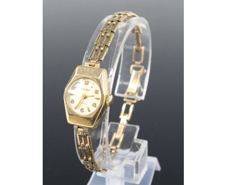 A vintage lady's Victor 9ct gold cased bracelet watch, having a signed champagne dial, manual wind movement, on gatelink brac