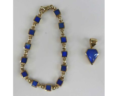 A contemporary 9ct yellow gold and blue enamel set sectional bracelet, arranged as 13 square sections each enamelled in shade