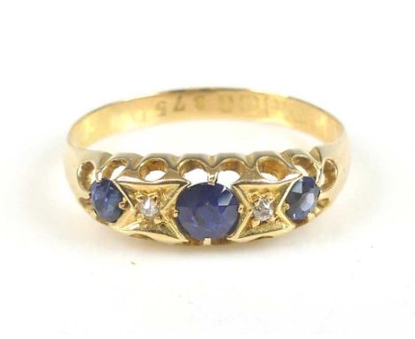 An 18ct yellow gold, sapphire and diamond half hoop ring, featuring three graduated round sapphires alternating with two Old 