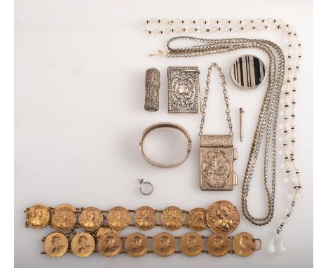 A group of items to include a Victorian white metal bangle with engraved decoration, a belt with Art Nouveau medallions, aide