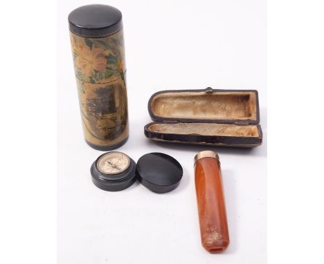 An amber and gold mounted cheroot holder:, cased, a small pocket compass and a Mauchline ware cylindrical box and cover decor