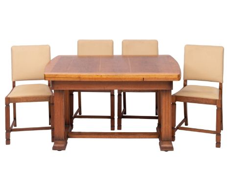 An oak draw leaf dining table and four chairs en suite, circa 1930s; the rectangular top with shallow bowed ends, on square s